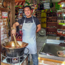 Candy man making carmelized nuts, Puerto Vallarta Walking Tours.-