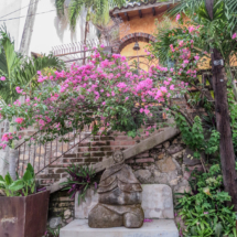 Gringo Gulch, stone statue, old woman, colonial architecture, Puerto Vallarta Walking Tours